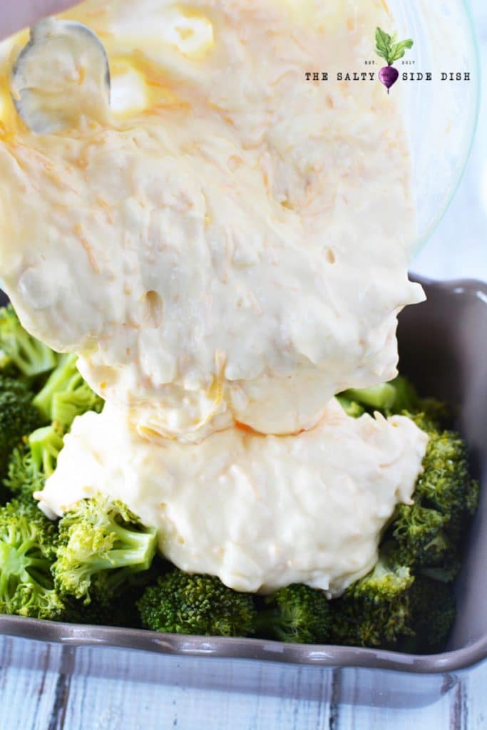 Broccoli Cheese Casserole an ultra easy and ultra cheesy side dish with ritz crackers #broccoli #casserole #sidedish pour broccoli casserole cheese mixture over fresh broccoli right in the casserole dish