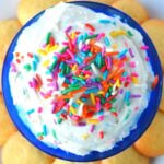 funfetti dip made with cake batter and filled with delicious sprinkles, surrounded by vanilla wafers to serve.