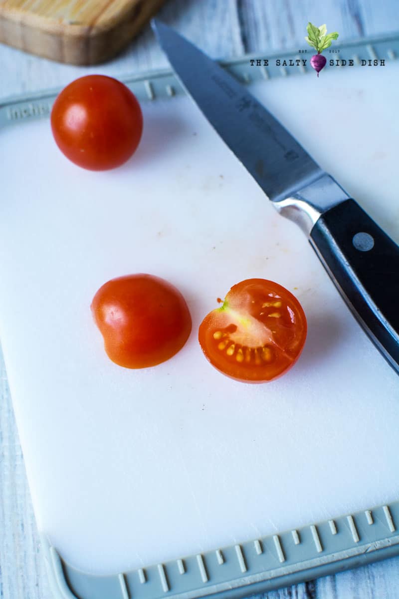 tomatos cut in half to make up the lady bug body
