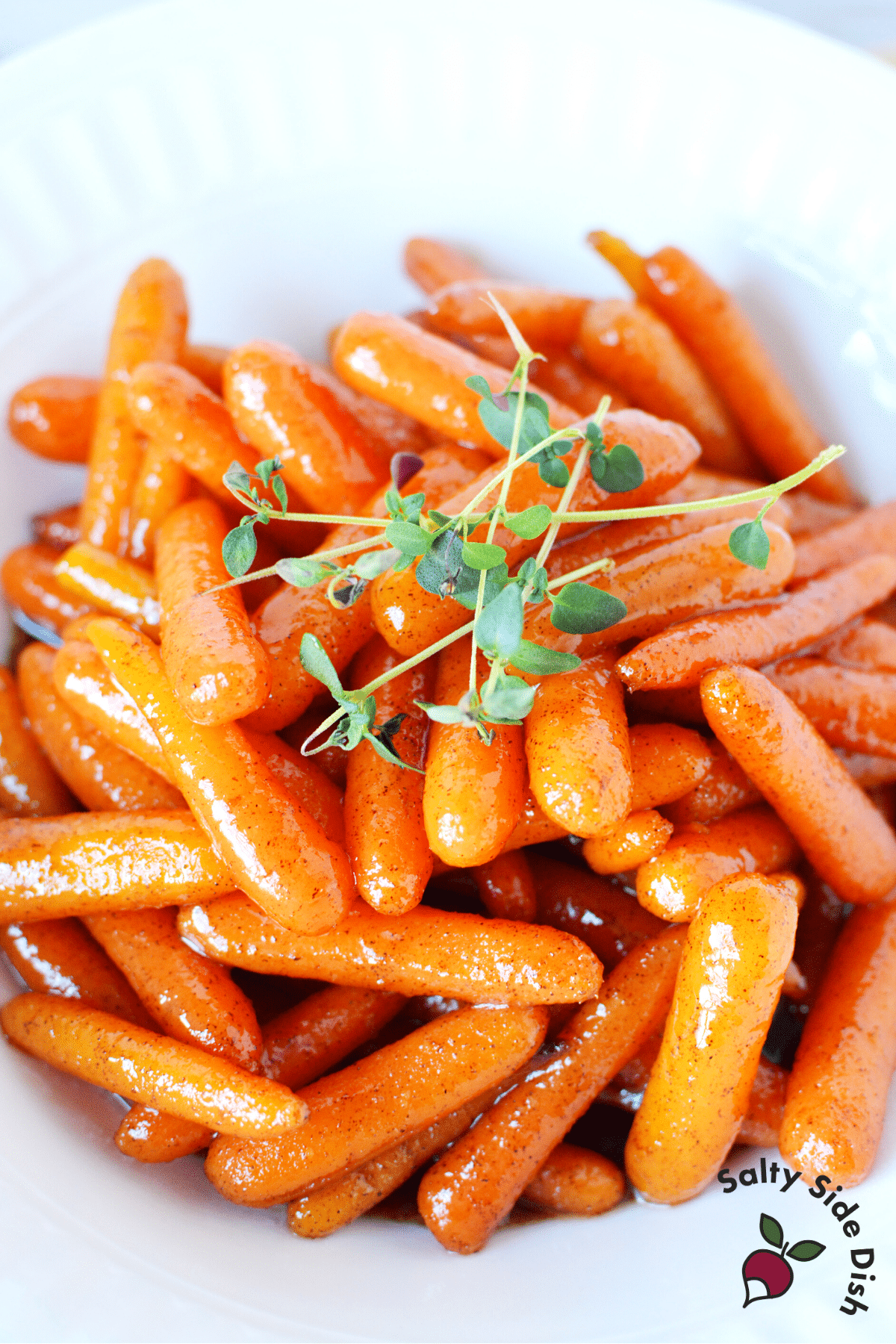 cinnamon carrots on a white plate