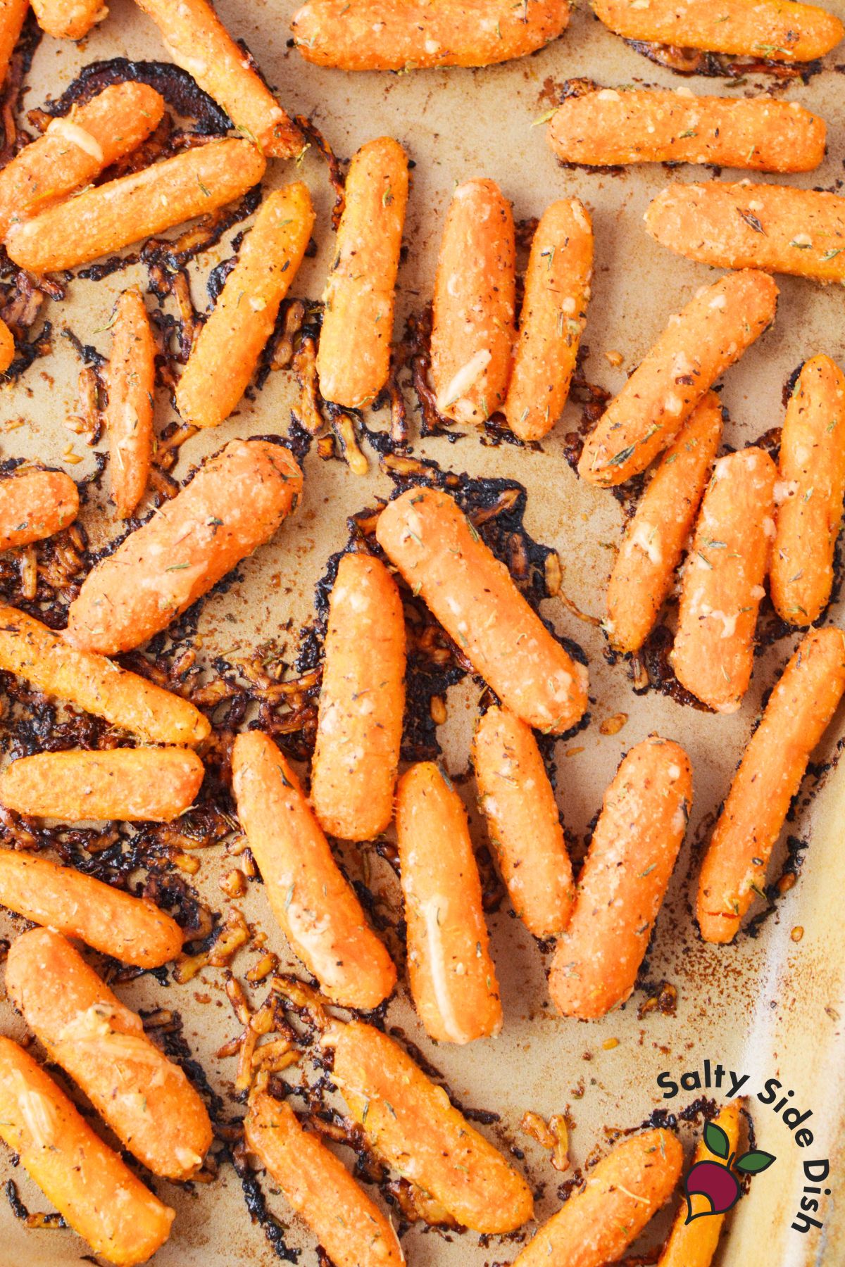 oven roasted baby carrots with parmesan cheese baked until golden and slightly crisp