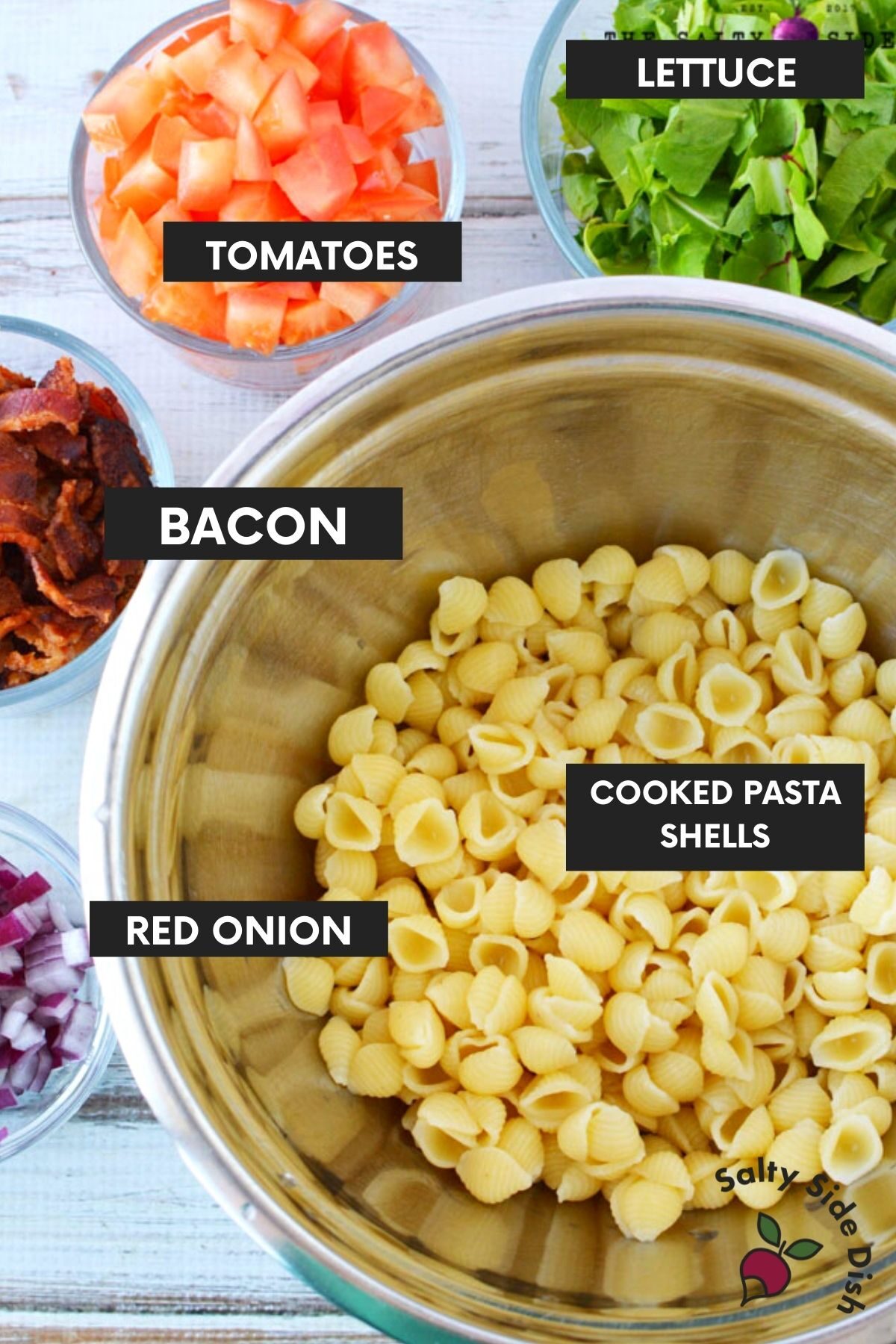 blt pasta ingredients laid on a table that are labeled in the image.