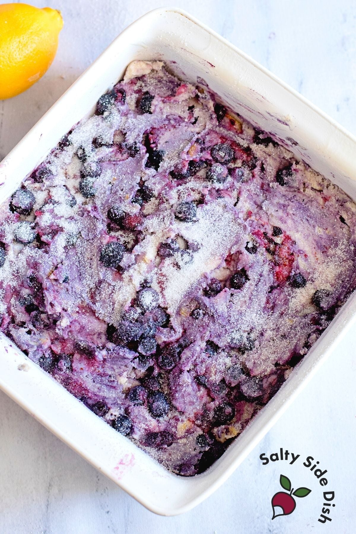 lemon blueberry cake in a pan.