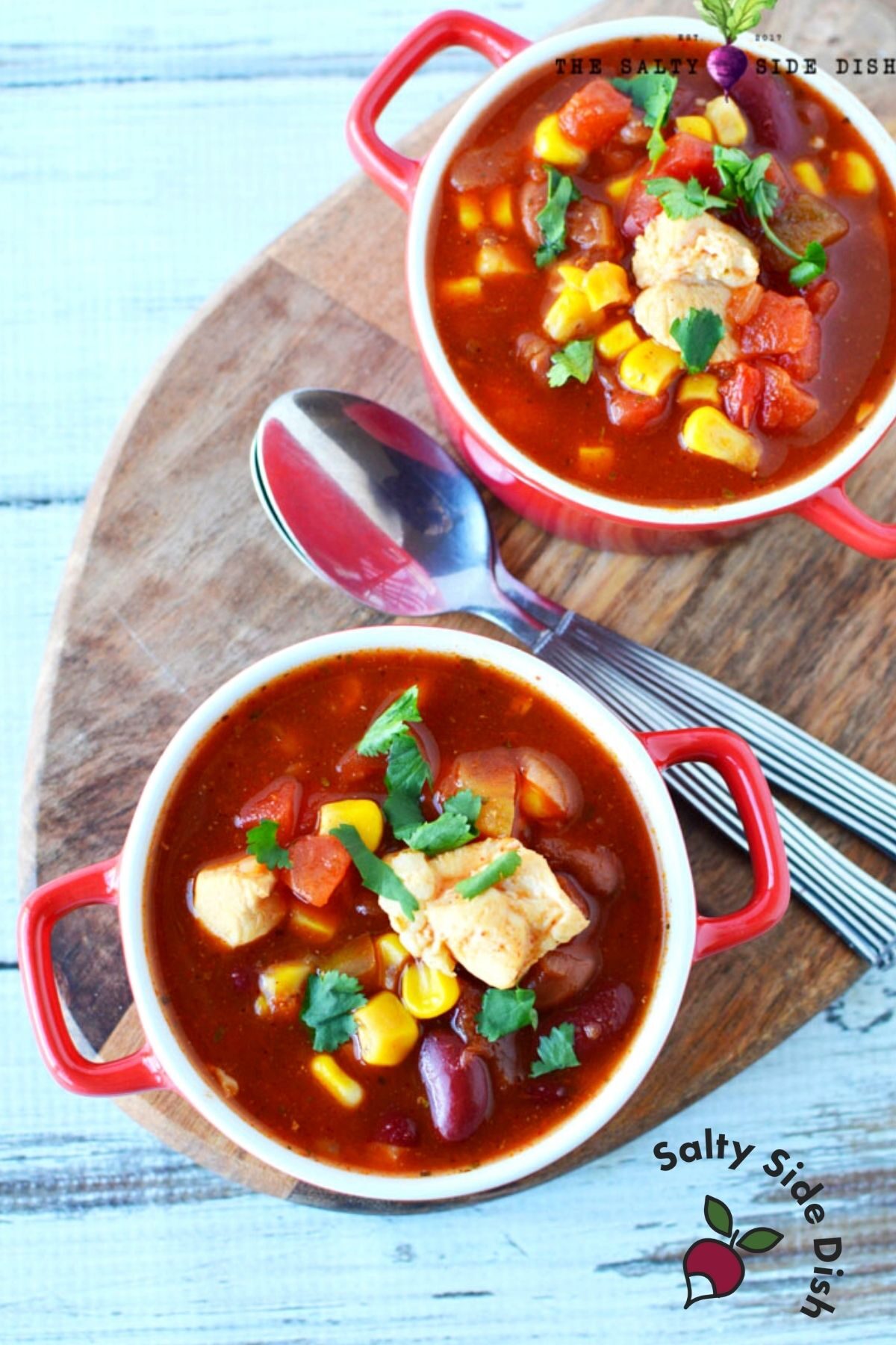 Mexican chicken chili soup with two bowls.