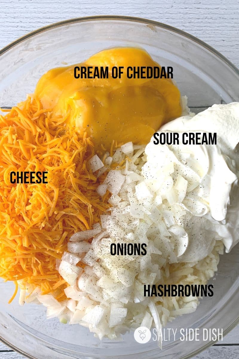 Ingredients for hashbrown casserole laid out on a kitchen counter.