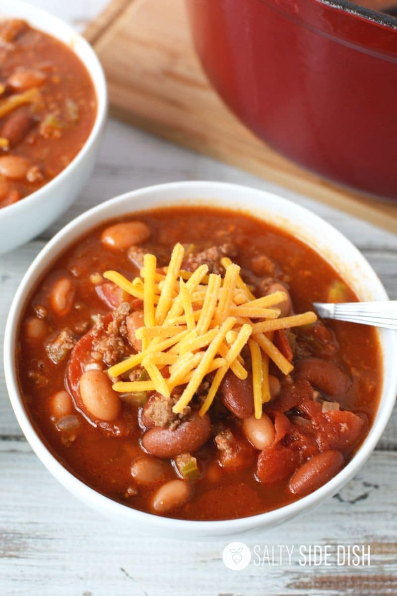 cheese on chili topped in bowl for Wendy's Copycat Chili Recipe
