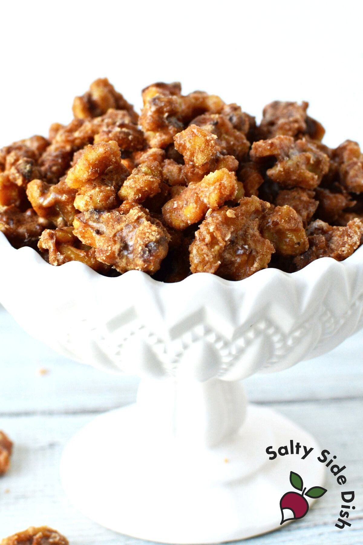 candied walnuts in a white dish. 