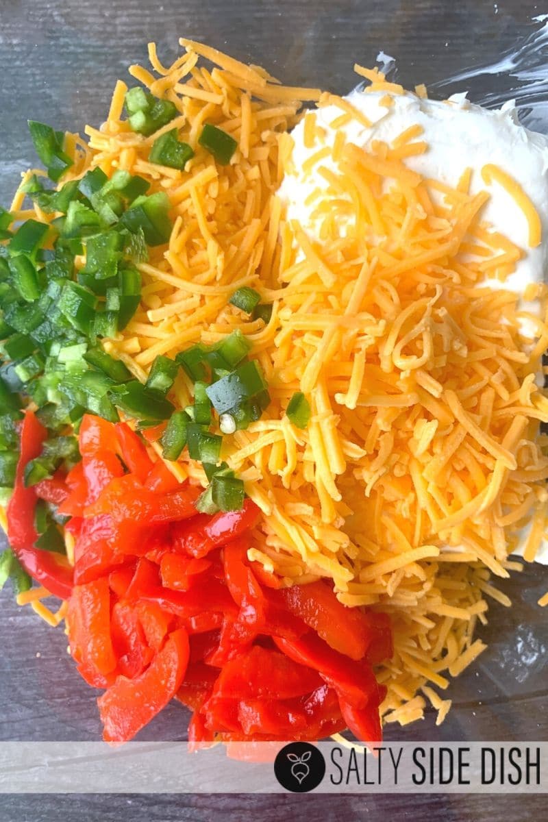 pimento cheese dip ingredients piled in a bowl