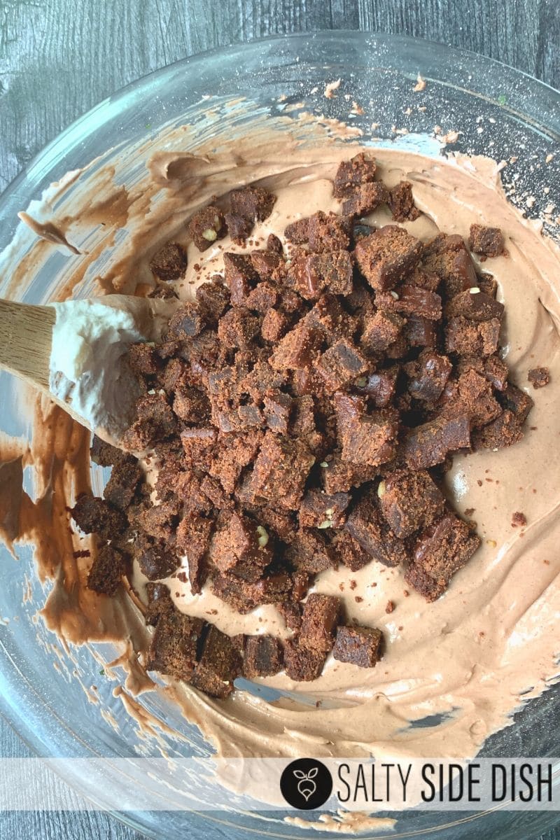 Brownie Batter Dip Appetizer Recipe, a sweet dessert dip to pair with strawberries, apples, pretzels, or wafers - delicious chocolate on chocolate with chunks of real brownies and done in 5 minutes #desserts #chocolate #dips #pretzels #recipes Chunks of Little Debbie brownies cut into bite sized pieces are amazing in a chocolate brown dip