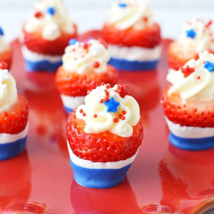 Red White and Blue Chocolate Dipped Cheesecake Stuffed Strawberries
