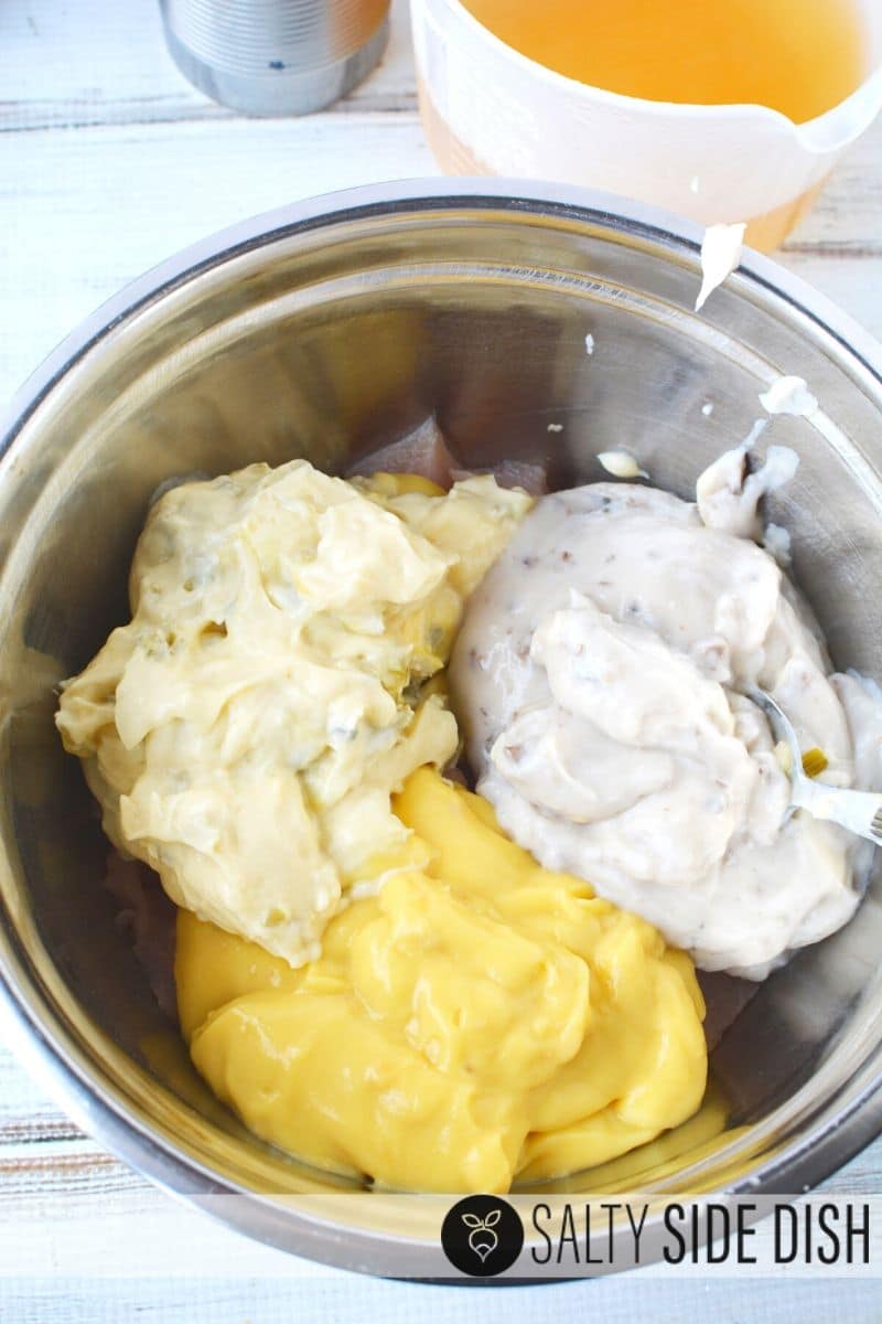 Easy Chicken and Rice Bake with Cream of Condensed Soups, a savory filling dinner with Pantry ingredients combined cream of soups in one bowl