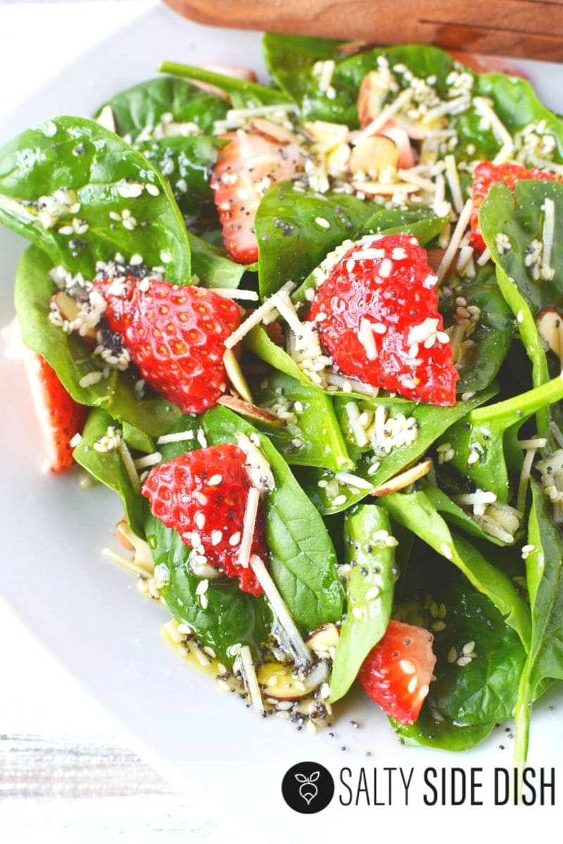 Easy 10 minute salad side dish with spinach, strawberries and homemade sweet dressing
