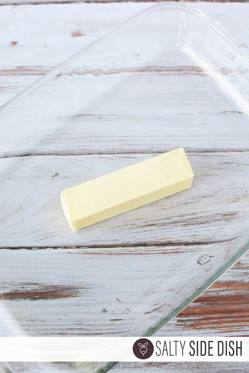 Stick of butter in bottom of roasting dish or pan