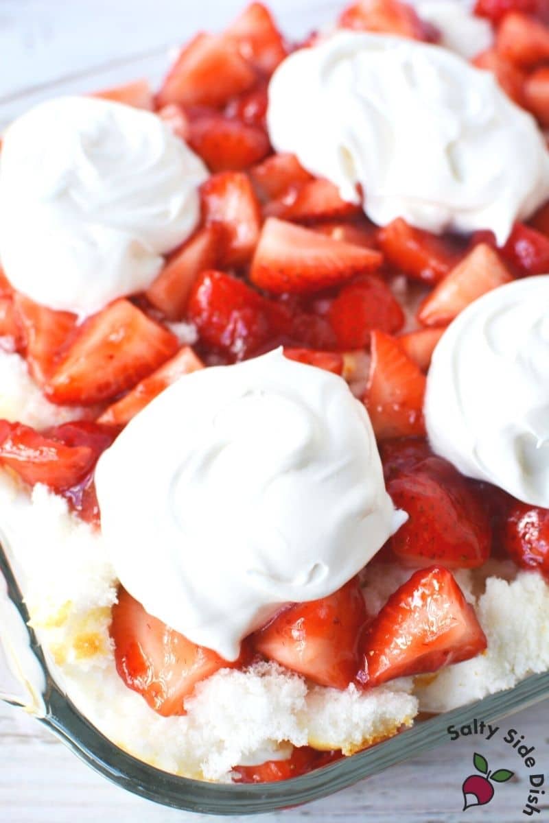 add more whipped cream and extra strawberries to the top