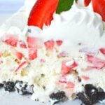 best strawberry and oreo ice box cake sitting on a plate
