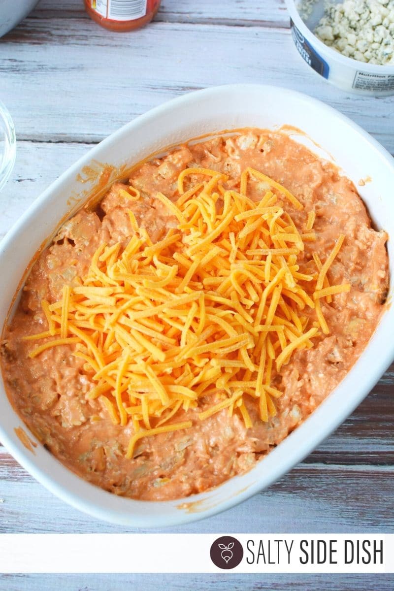 Buffalo Chicken Ranch Dip with loads of cheddar cheese on top