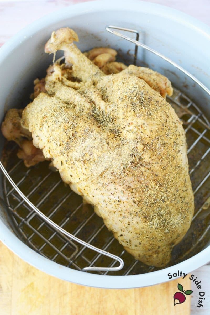 heavily season turkey breast before placing air fryer lid onto ninja foodi