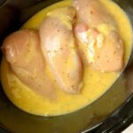 raw chicken breasts in a crock pot