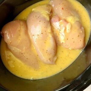 raw chicken breasts in a crock pot