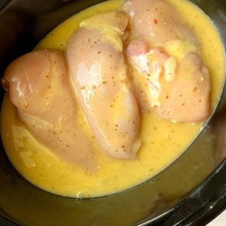 raw chicken breasts in a crock pot