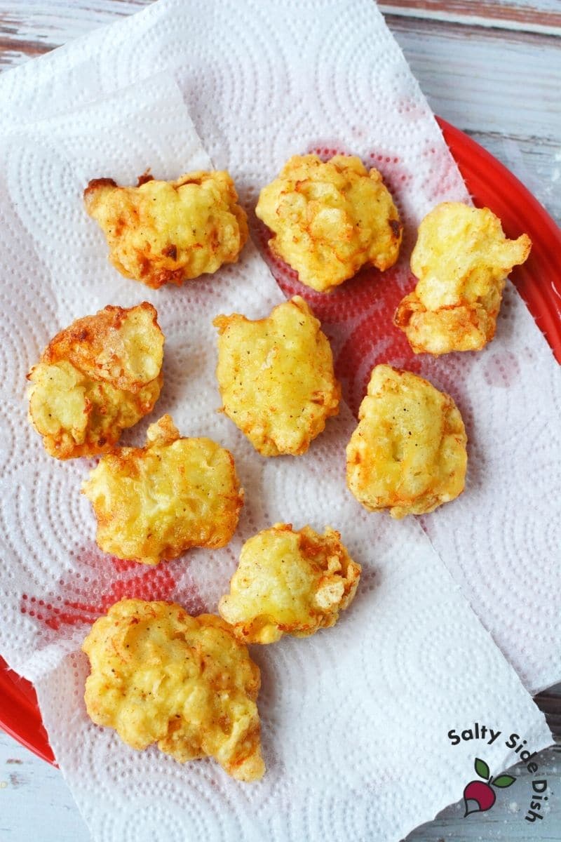 TikTok McDonalds Chicken Nuggets Recipe at home, a copycat recipe and viral food trend fry chicken nuggets in oil and drain on a paper towel