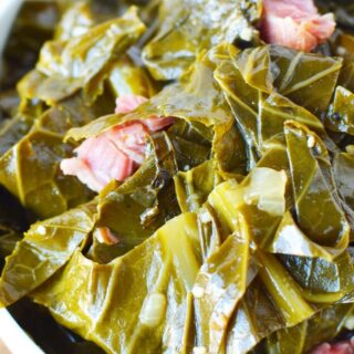 slow cooked collard greens in a bowl with ham