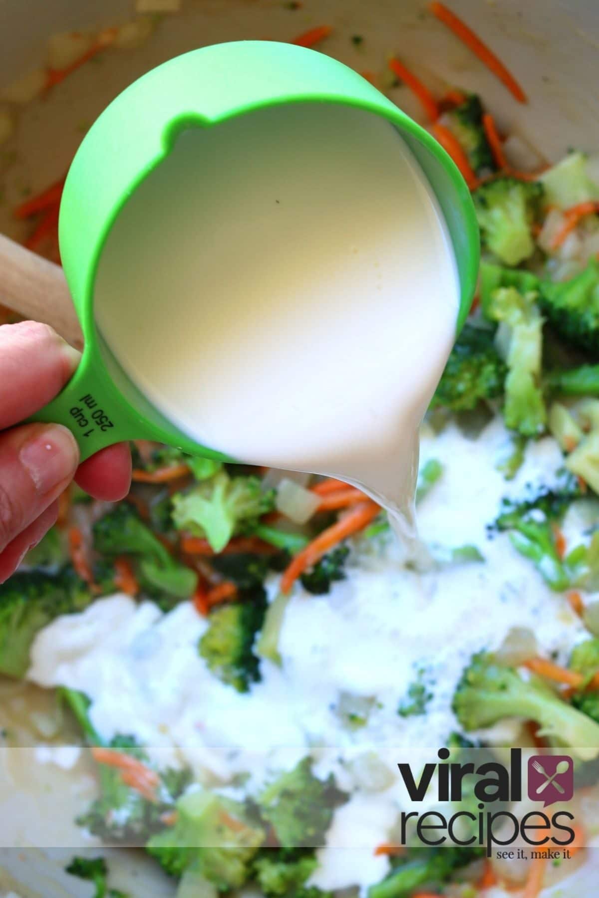pouring half and half into soup