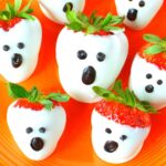 featured strawberry ghosts on a plate.
