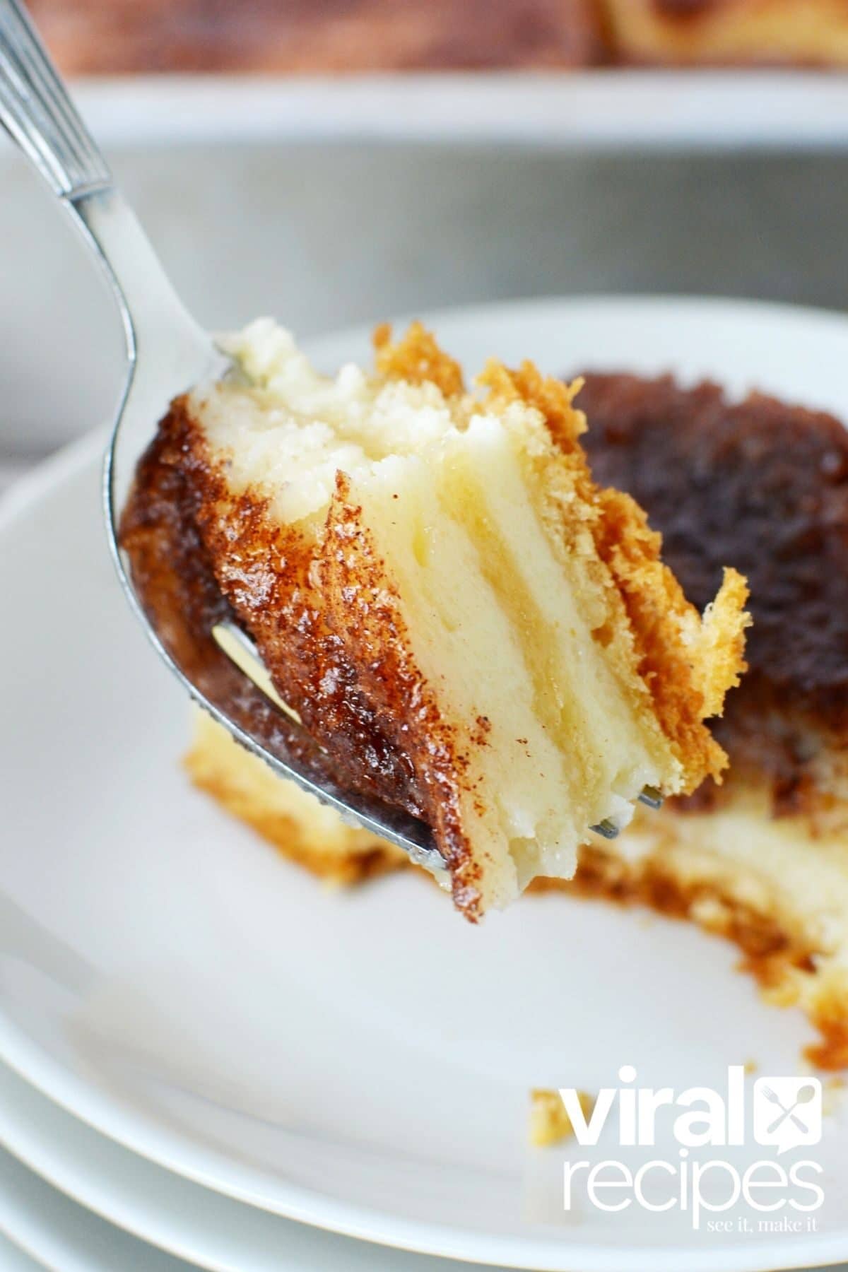 bite of sopapilla cheesecake bar on a fork.