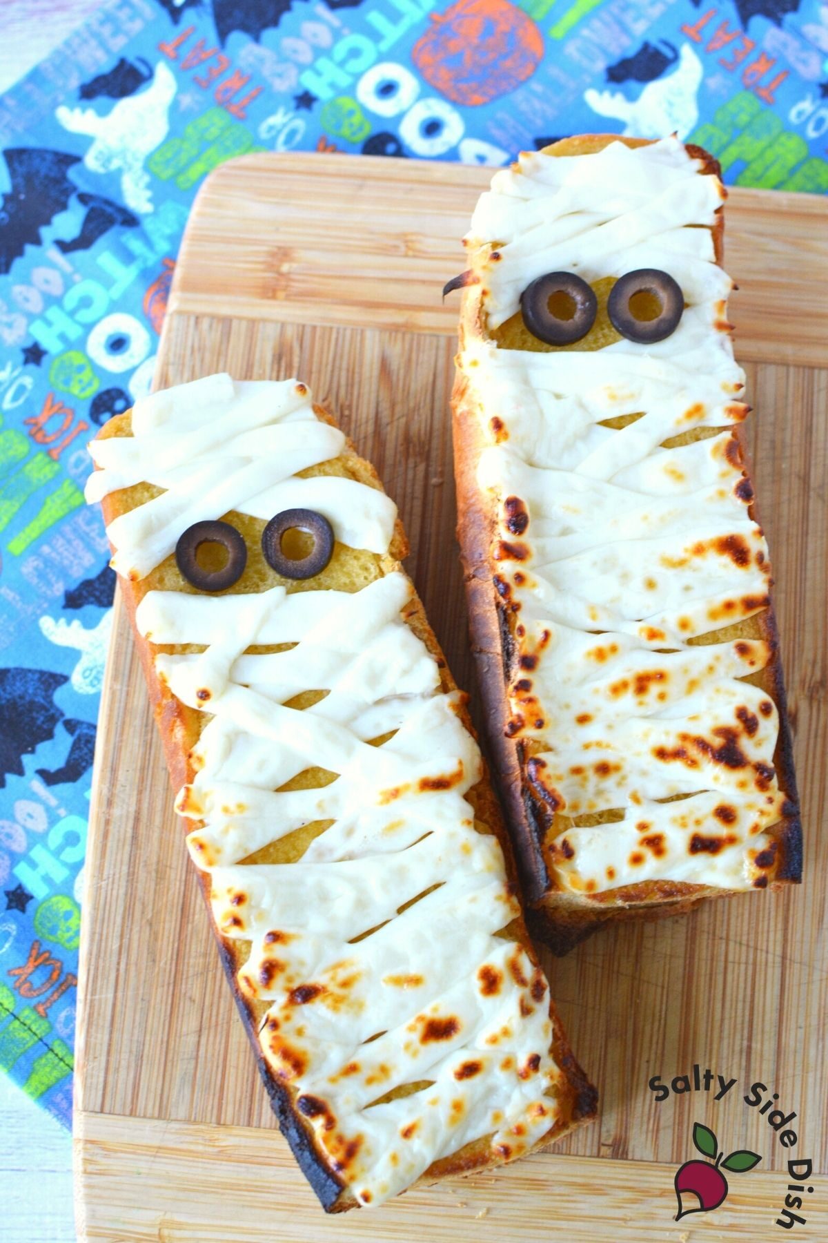 halloween mummy bread on a table.
