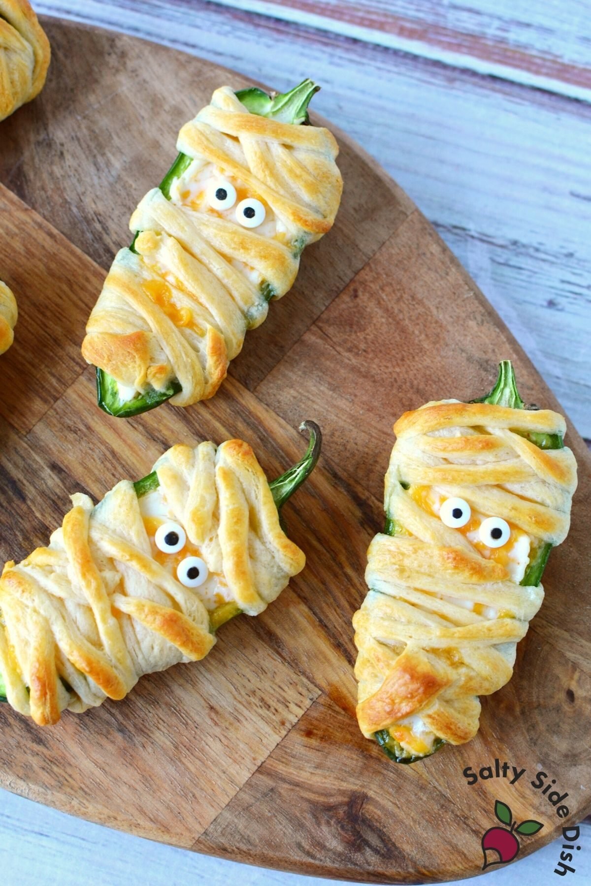 plate of mummy jalapeno poppers.