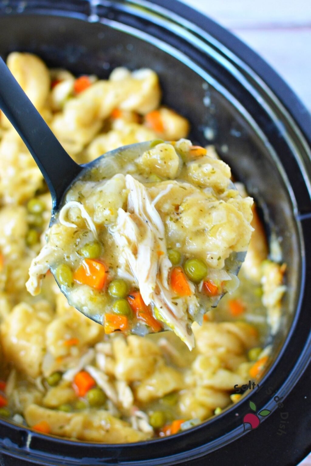 Crockpot Chicken and Dumplings with Canned Biscuits | Salty Side Dish