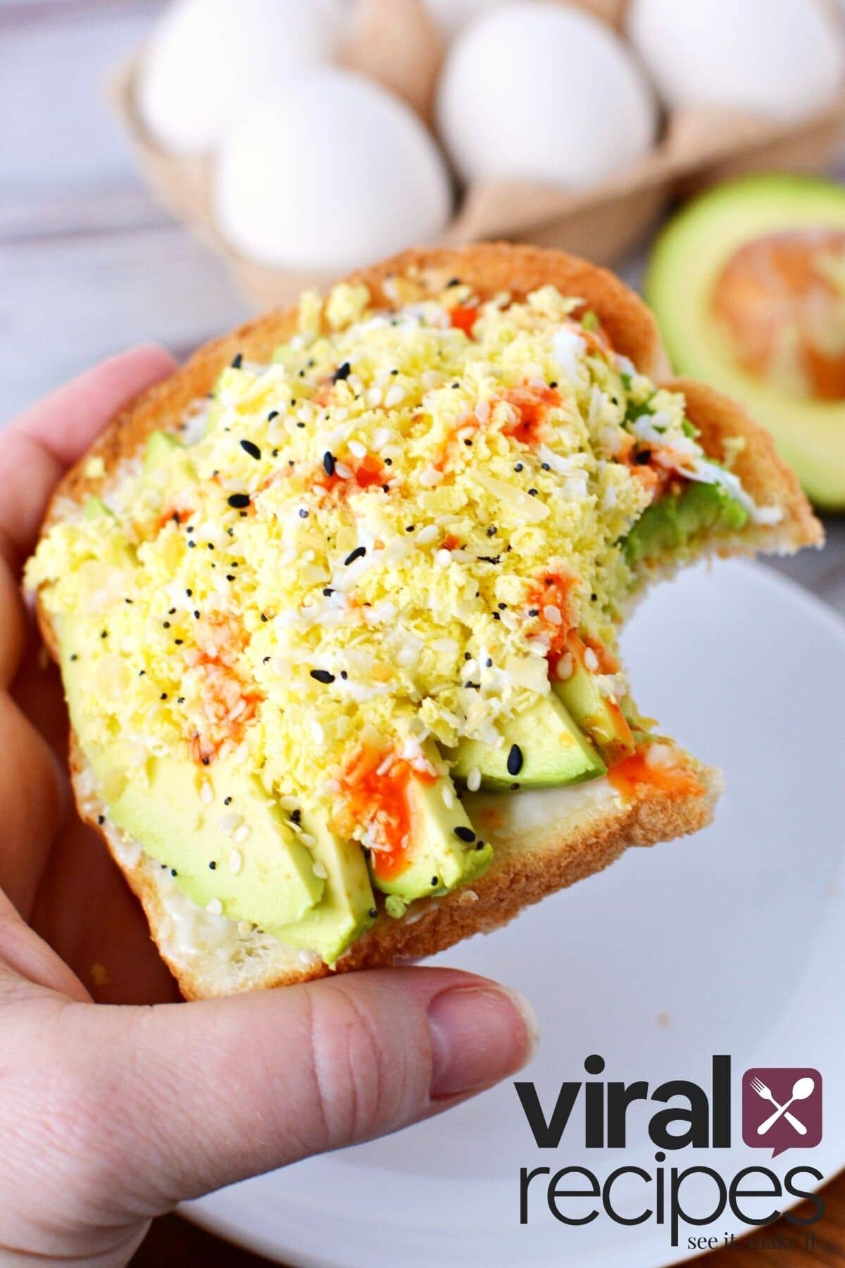 grated egg on avocado toast.