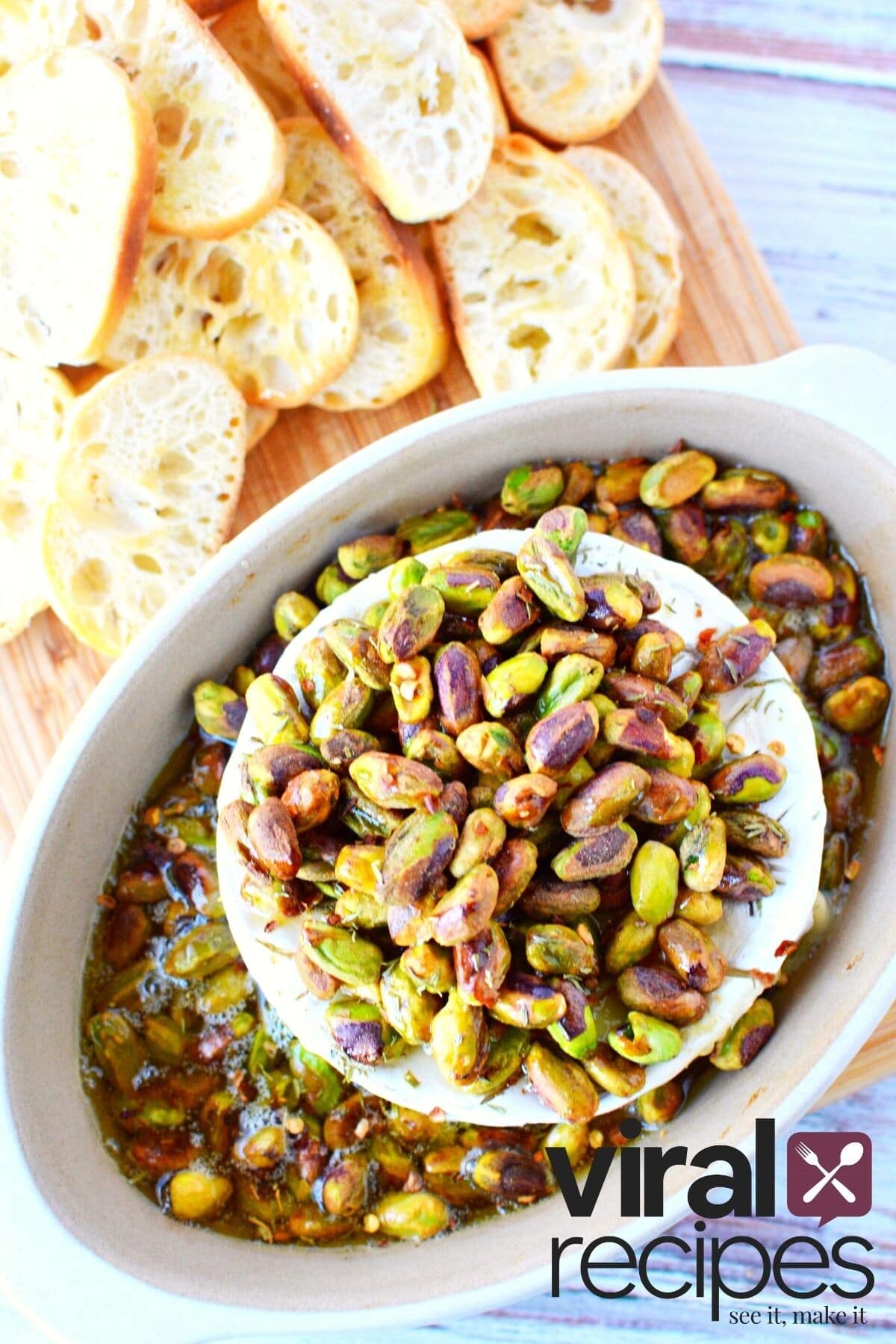 pistachios and honey on a round of baked brie.