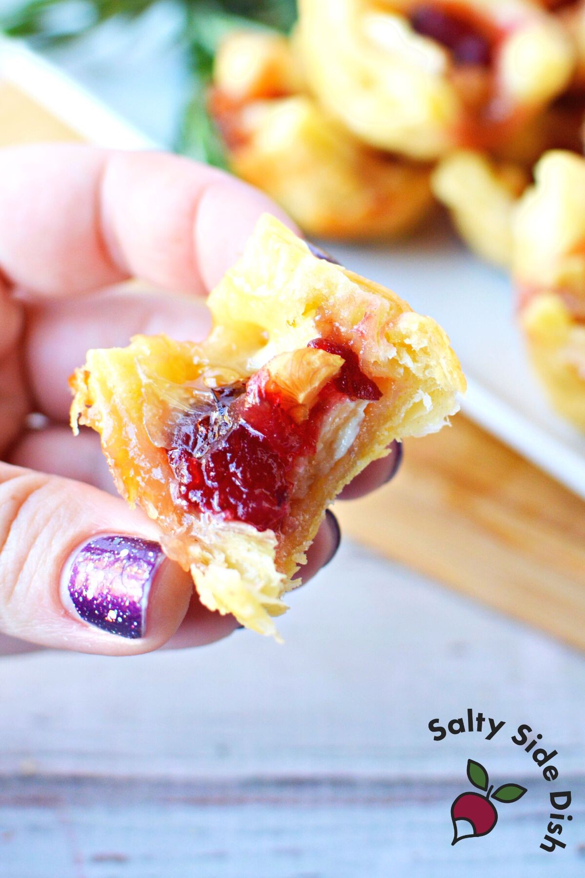 brie bites with cranberry sauce.