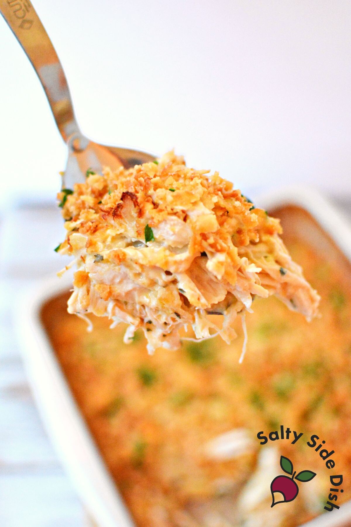 scoop of best chicken casserole.