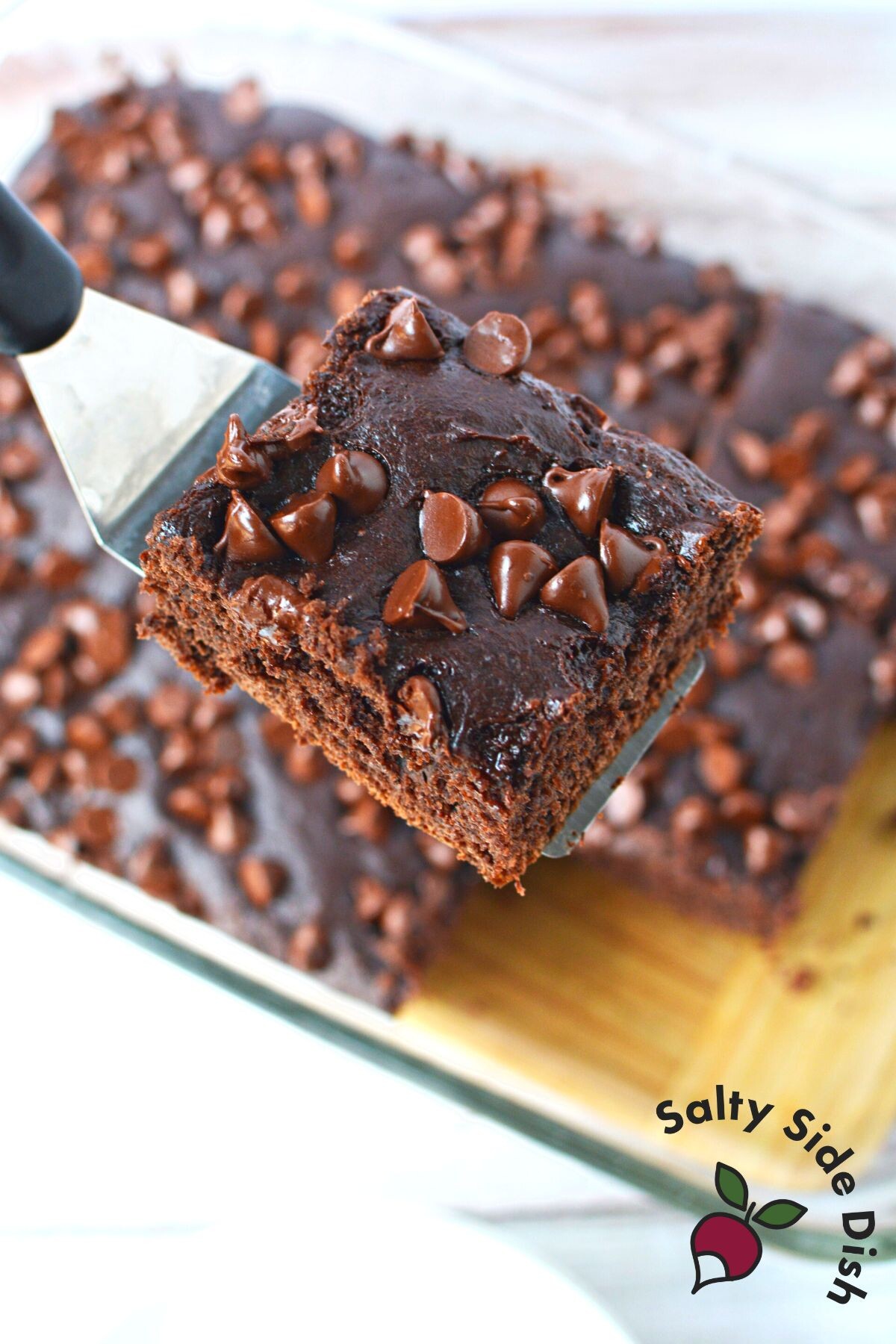 spatula with a piece of cake.