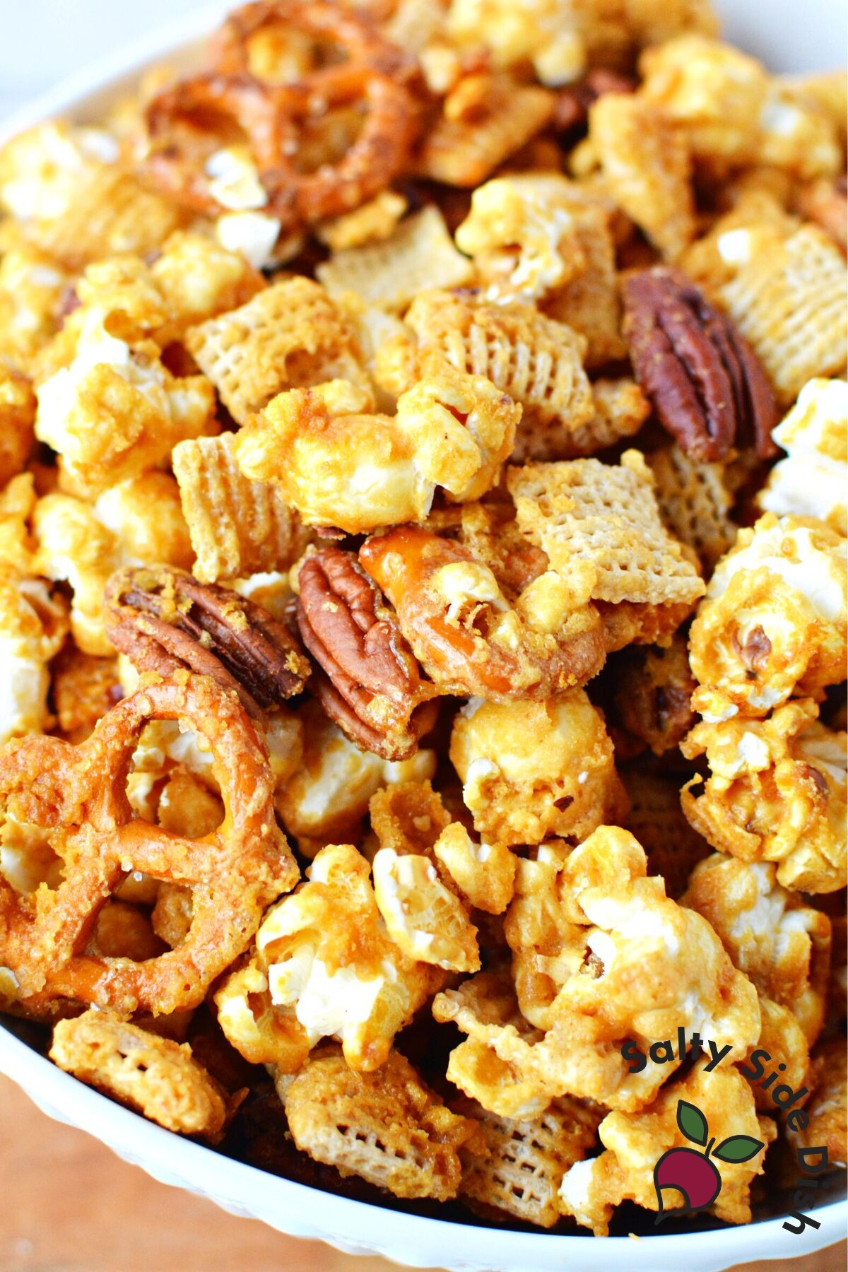 bowl of caramel snack mix .