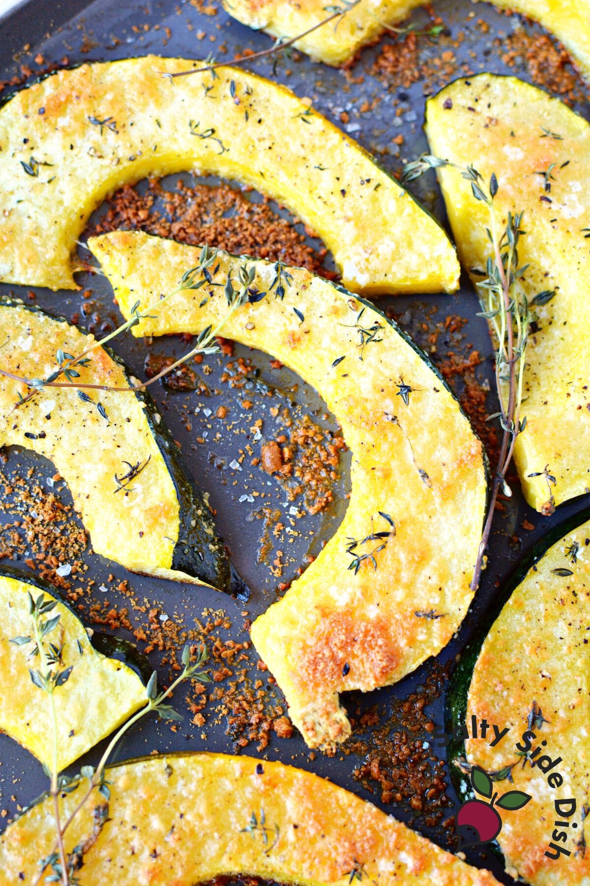 oven roasted acorn squash on a sheet pan.