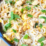 pad thai in a cast iron pan.