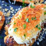 stovetop chicken in cast iron pan with breadcrumbs and ranch dressing.