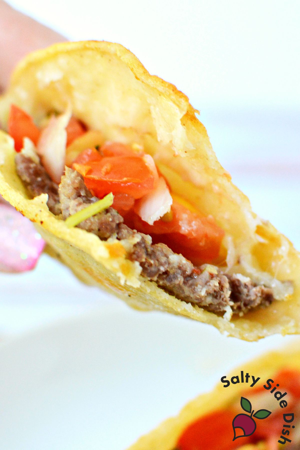 inside of a beef taco close up.