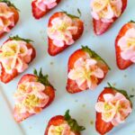 Close-up of deviled cheesecake strawberries