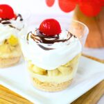 banana split cups on a serving tray.