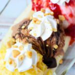 classic homemade banana split recipe in a boat.