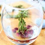 add water to cover just the bottom of the sprig.