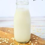 homemade oat milk in a container for storage.