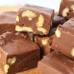 pile of microwave fudge cut into pieces.