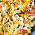 corn succotash pasta salad in a cast iron pan.