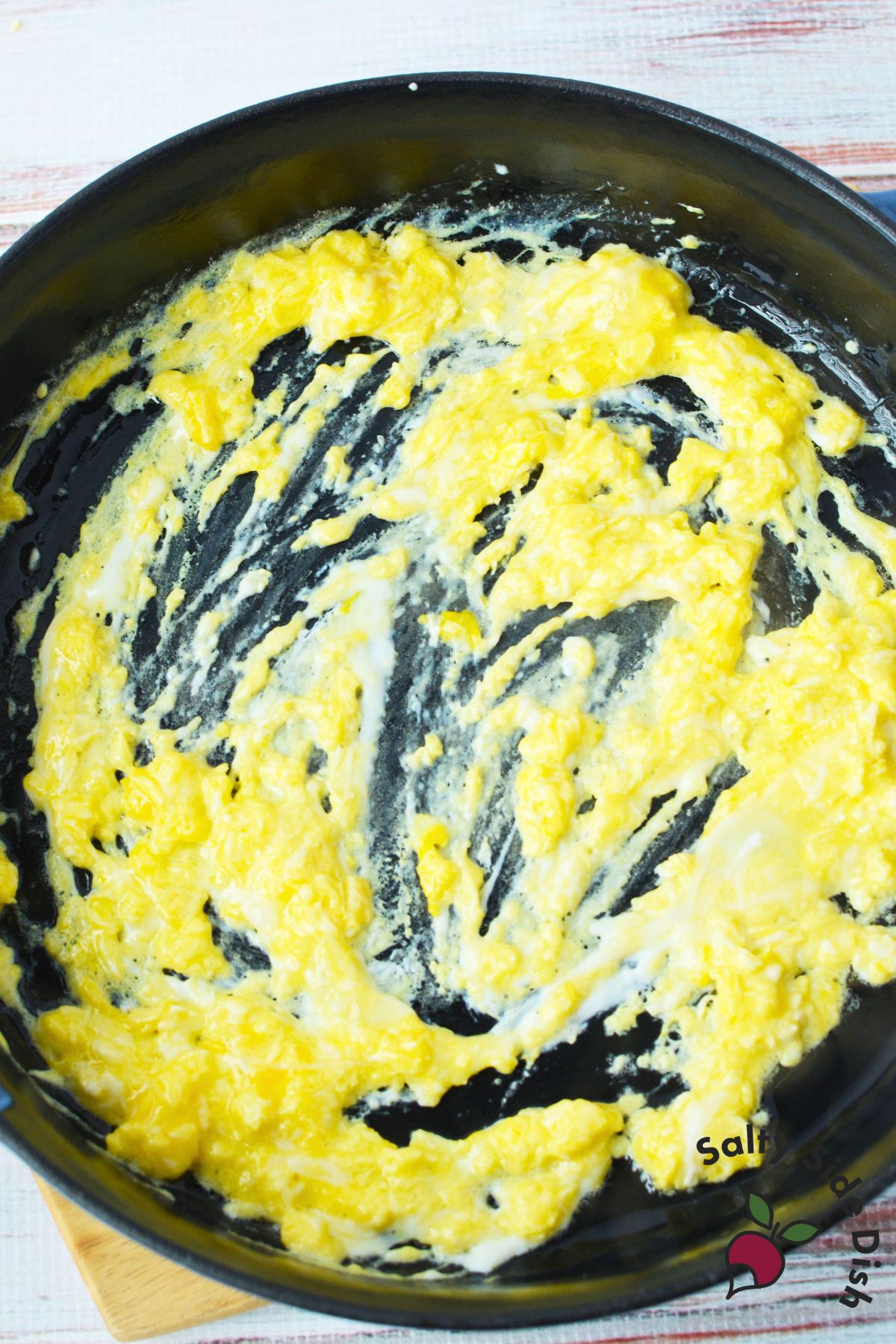 Lightly scrambled eggs in a skillet, ready for jasmine fried rice